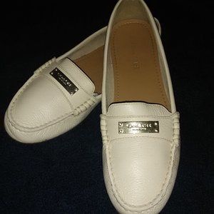 Beautiful ivory Coach flats